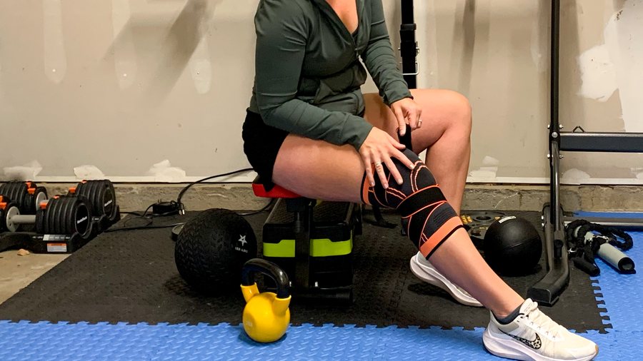 KneeNetic sleeve worn during a strength workout